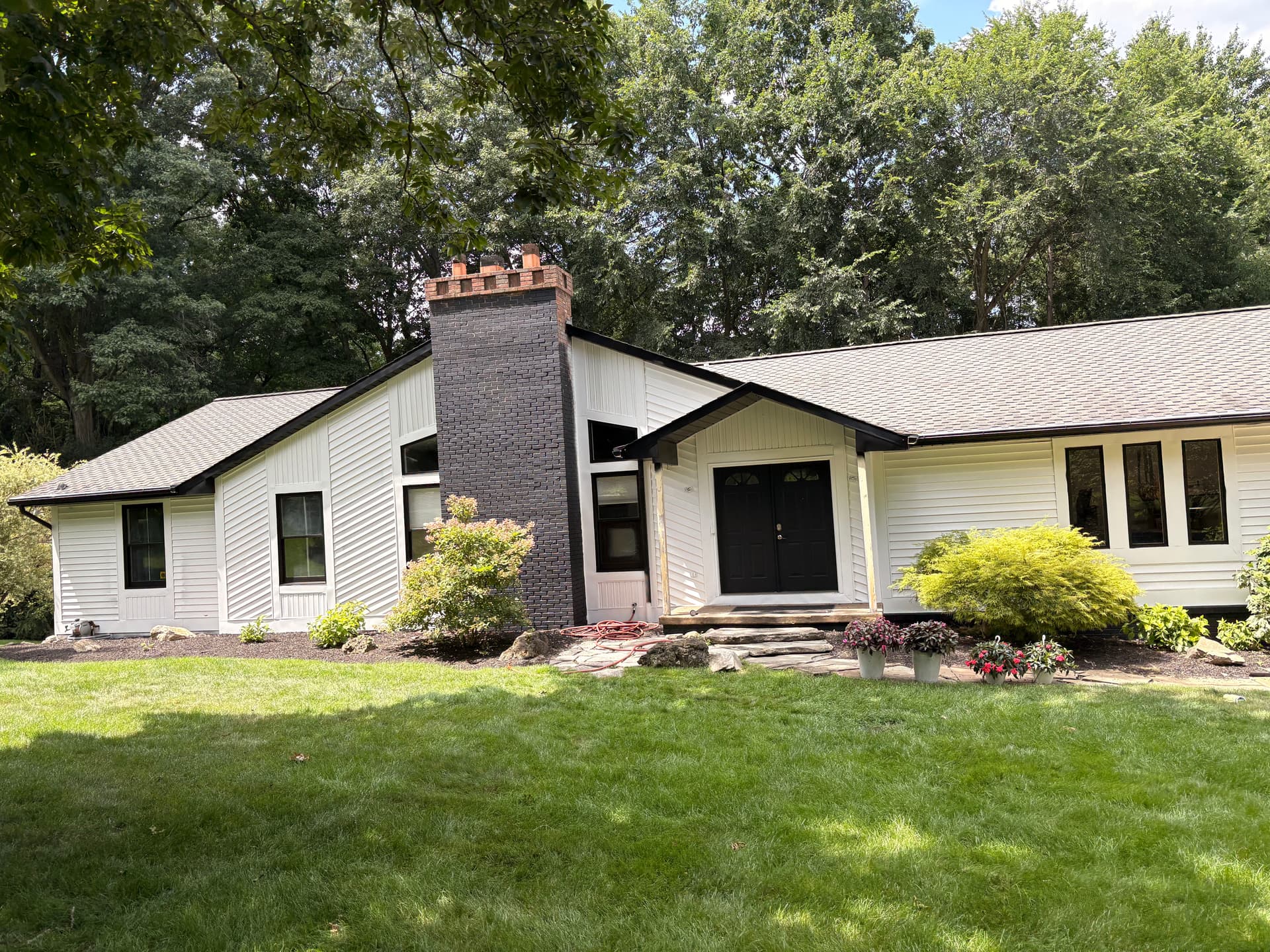 Gallery photos for Howell Home Gets a Bold Black and White Exterior Repaint: Image #1