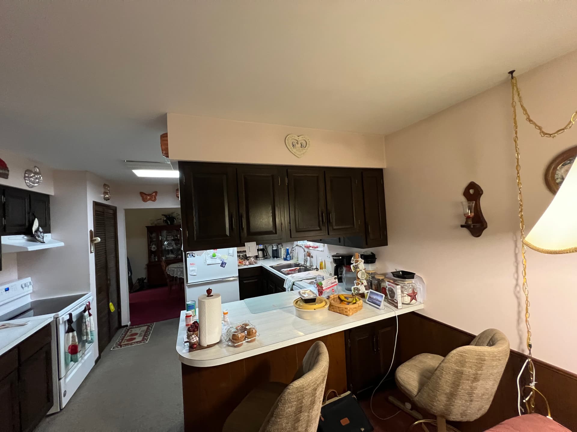 Gallery photos for Dark Kitchen Cabinets Refinished Bright White Without the Remodel: Image #4