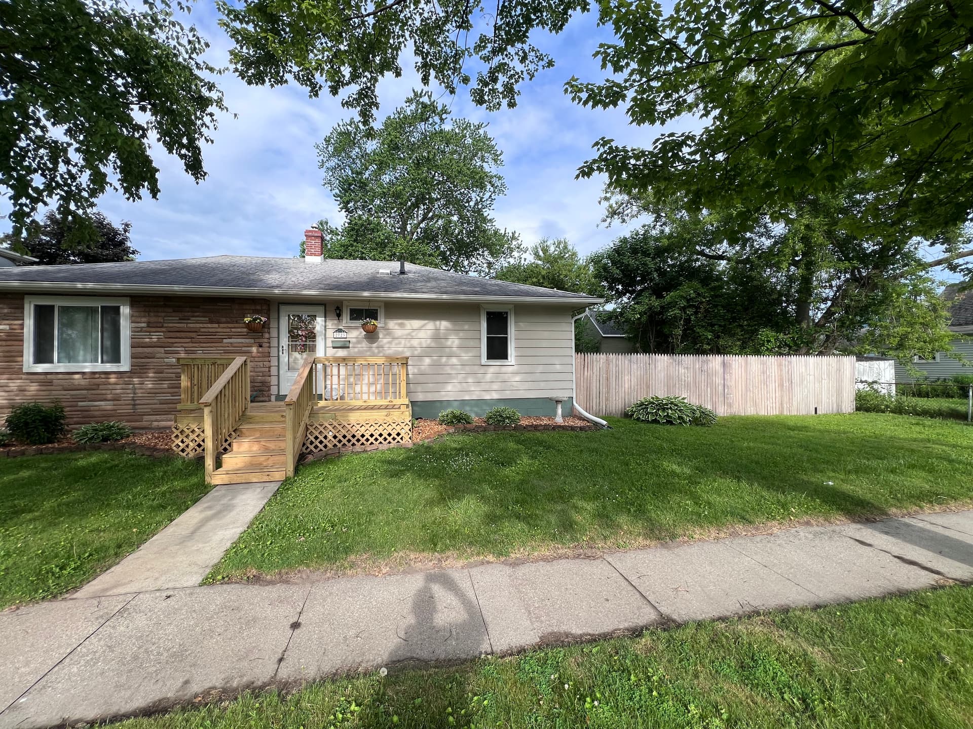 Before and After Exterior Painting on a Ranch-Style Home