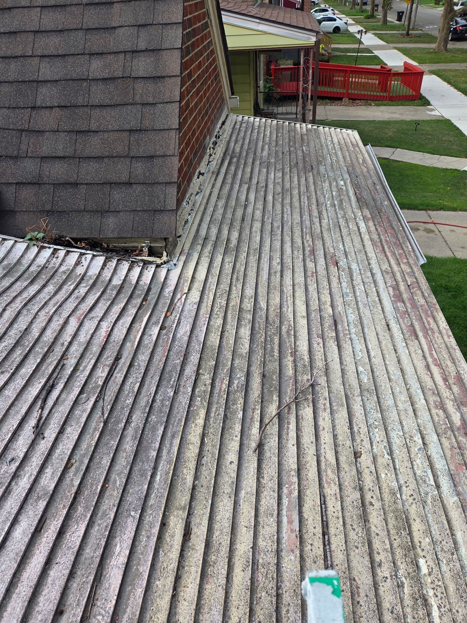 Project Metal Porch Roof Cleaning and Exterior Paint on a Brick Home image
