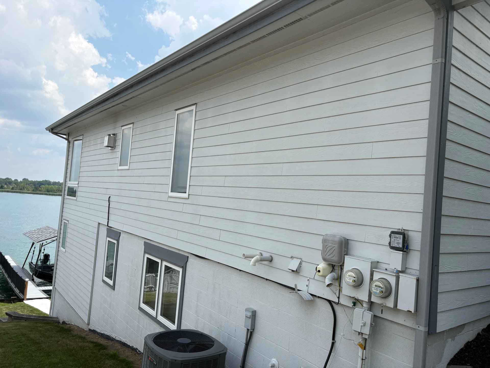 Lakefront Home Gets a Full Exterior Color Change image