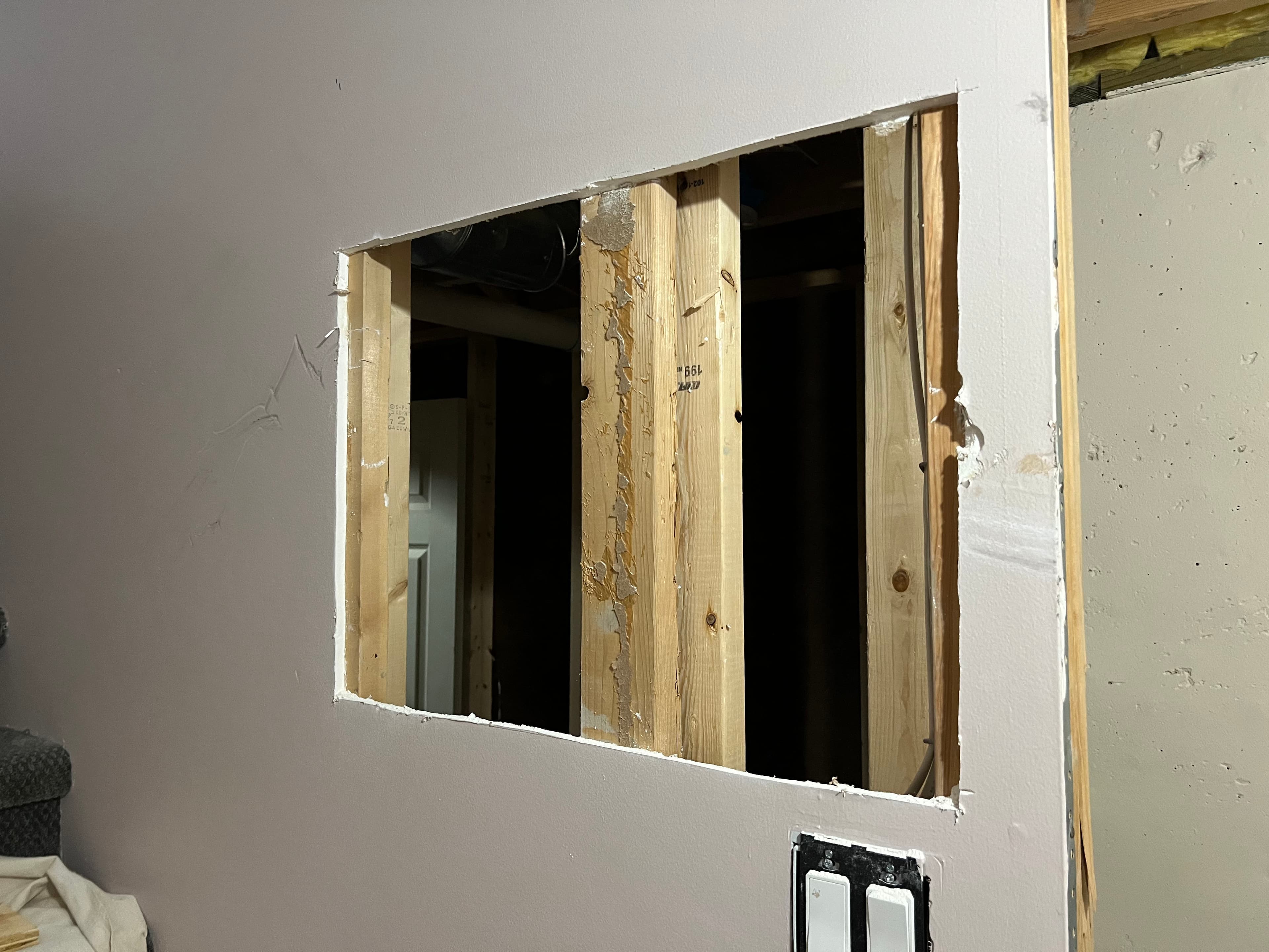 Project Large Wall Hole Repaired and Painted to a Clean Finish image