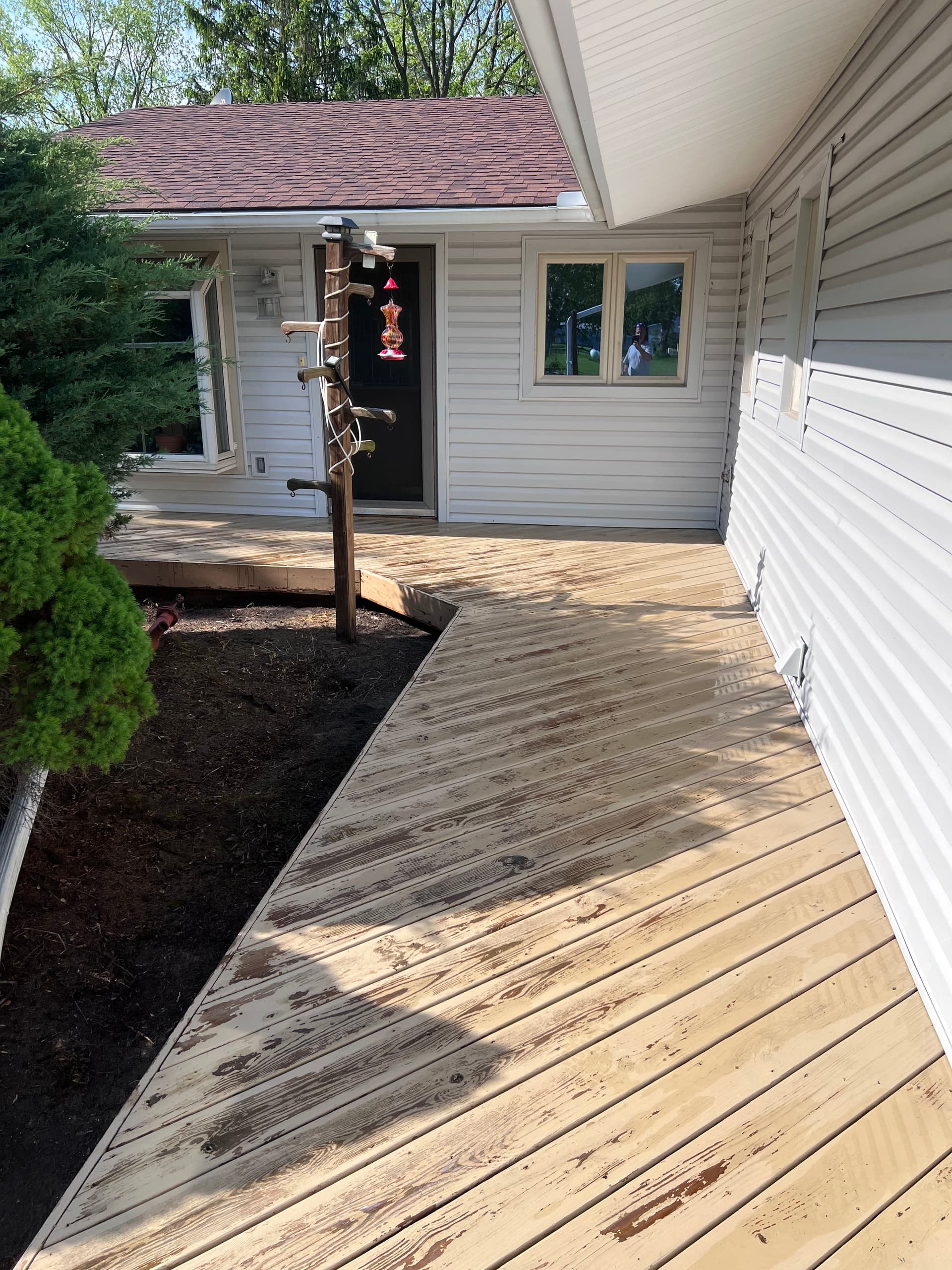 Peeling Deck Gets a Full Prep and Two-Coat Stain Finish image