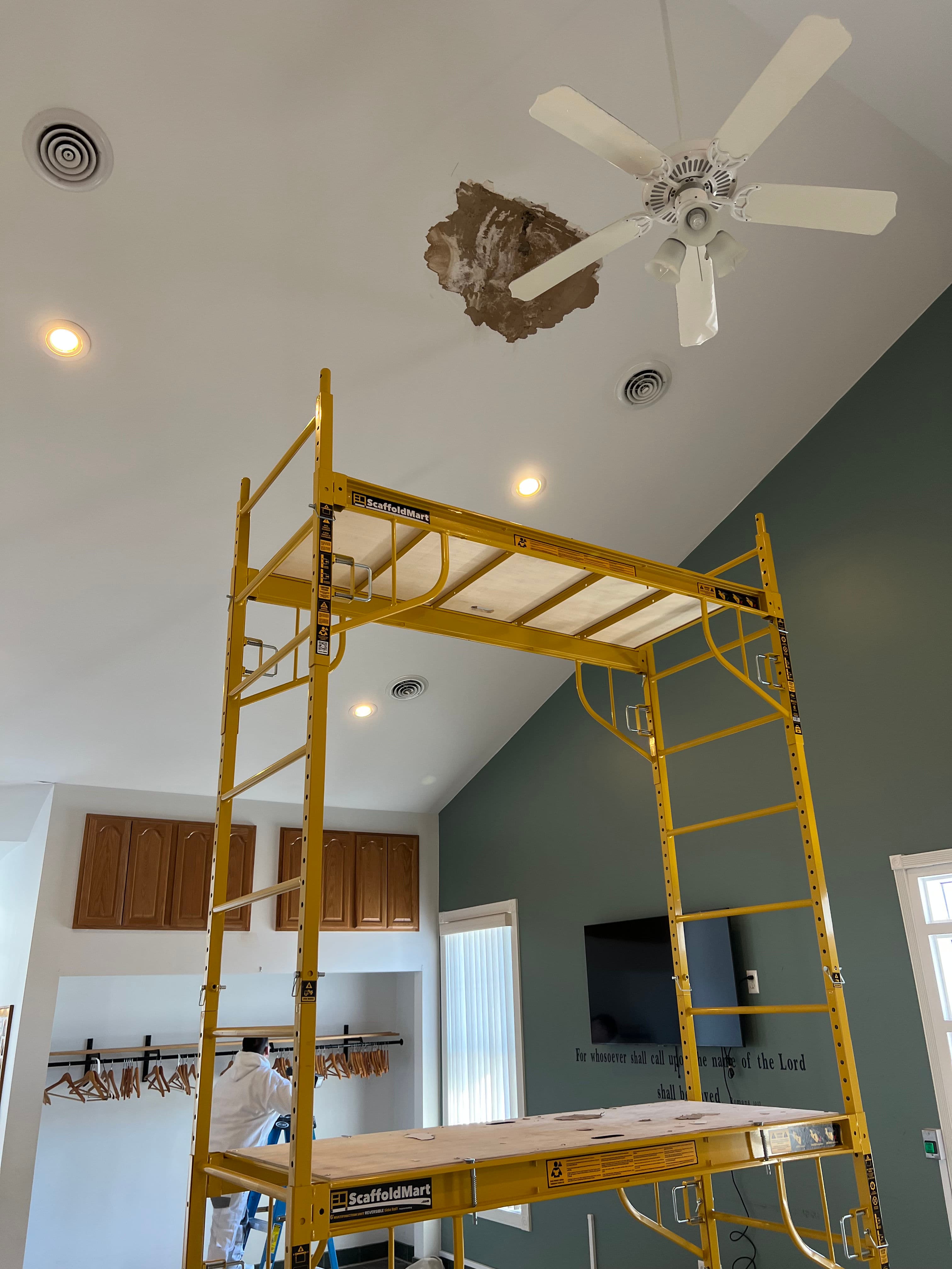 Project High Ceiling Leak Damage Repaired and Repainted Clean image
