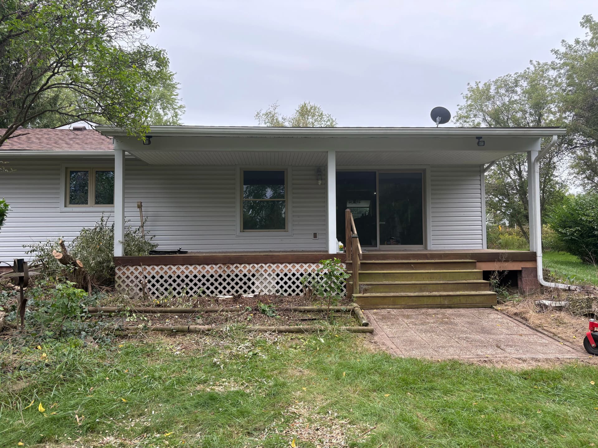 A Worn Deck Gets a Clean White Finish image