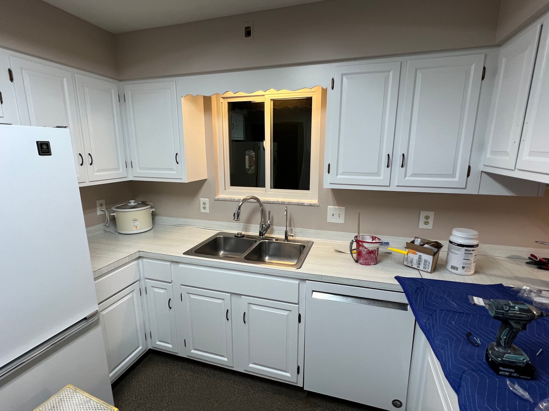 Gallery photos for Dark Kitchen Cabinets Refinished Bright White Without the Remodel: Image #1