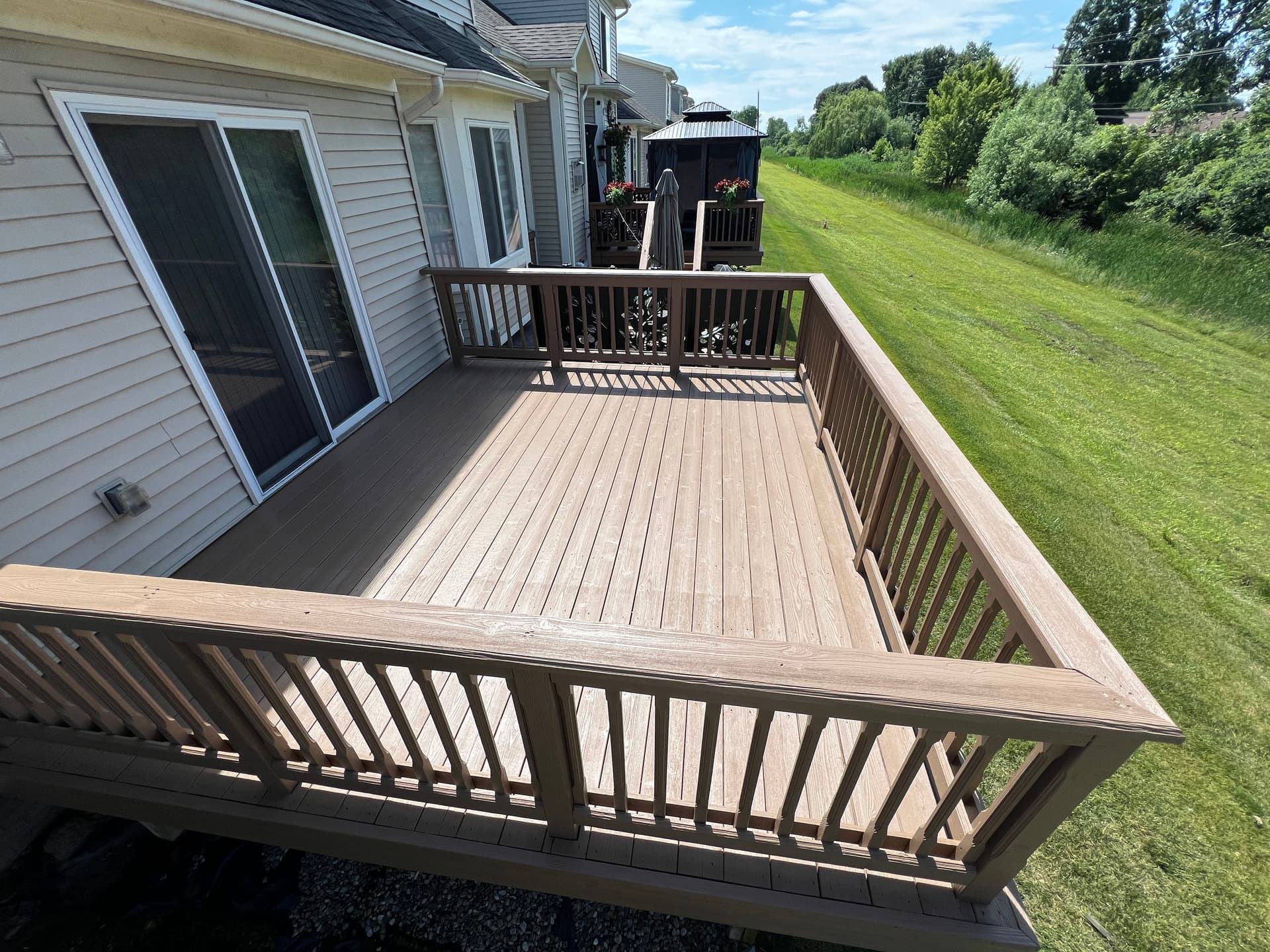 Gallery photos for Worn Deck Wood Gets a Solid Stain Resurface and Clean Finish: Image #1
