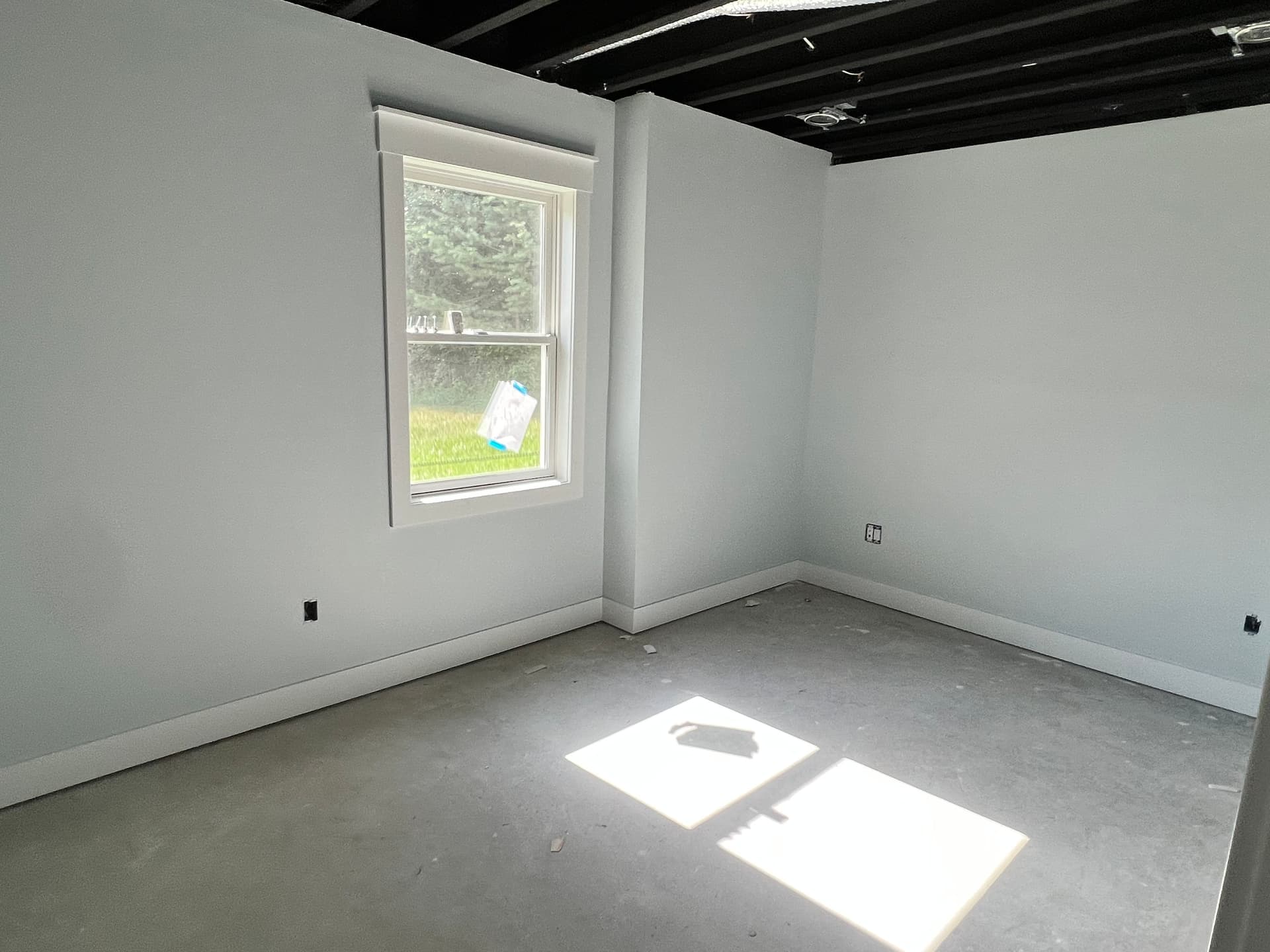 Gallery photos for Basement Finish Gets a Sharp Black Ceiling and Clean Painted Walls: Image #1