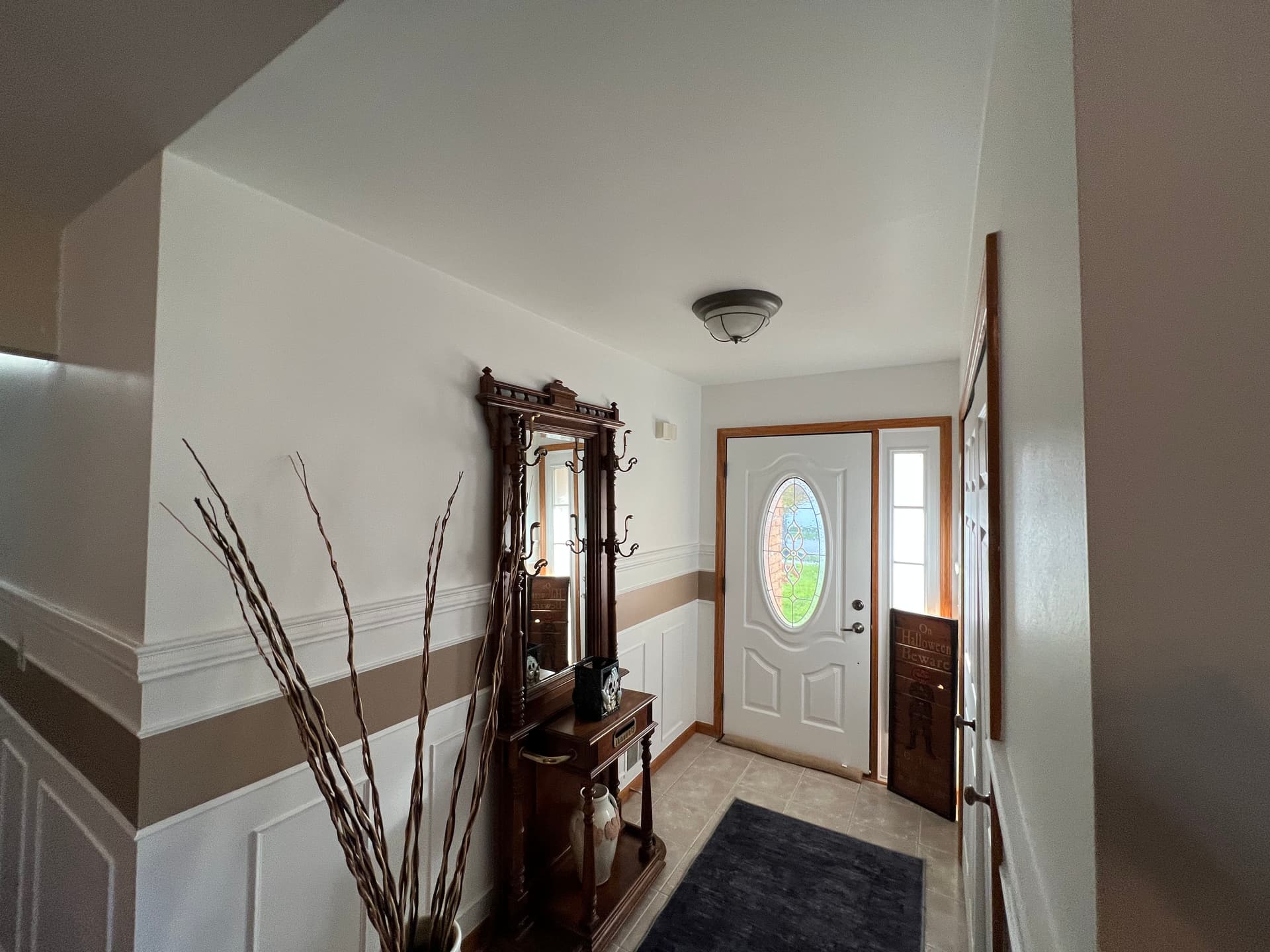 Chair Rail and Wainscoting Give This Hallway Real Character image