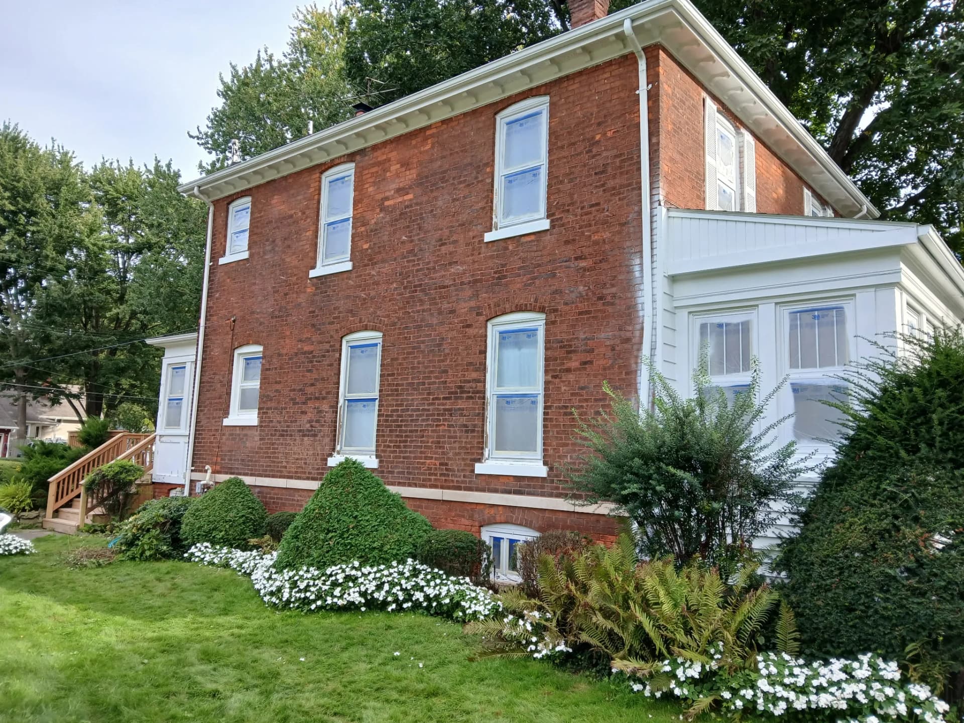 Gallery photos for Painted Brick Exterior Before and After on a Classic Two-Story Home: Image #2
