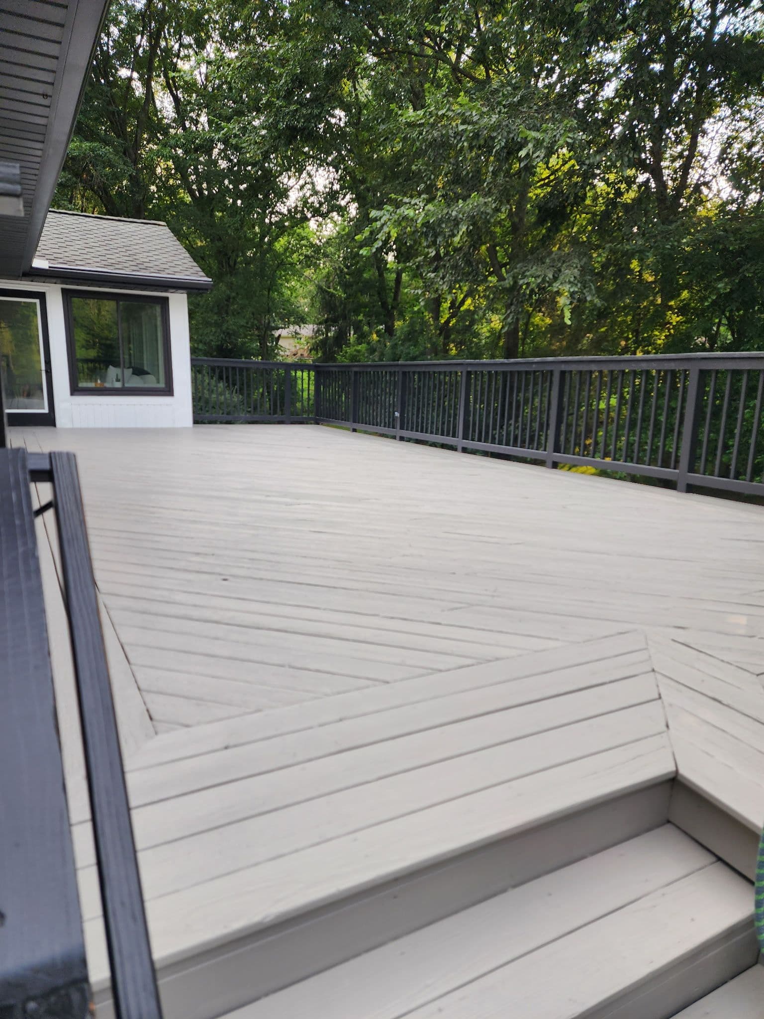 Gallery photos for White Siding, Black Brick, Fresh Deck - Full Home Exterior Repaint: Image #7