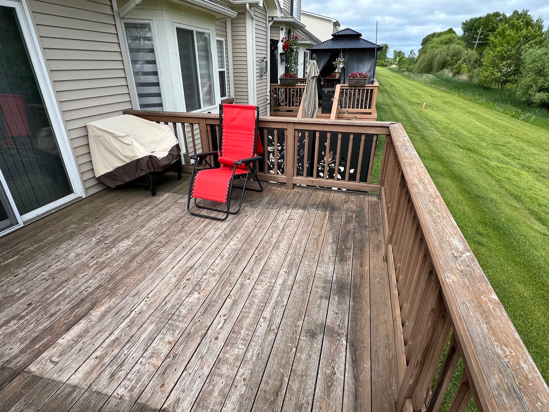 Worn Deck Wood Gets a Solid Stain Resurface and Clean Finish image