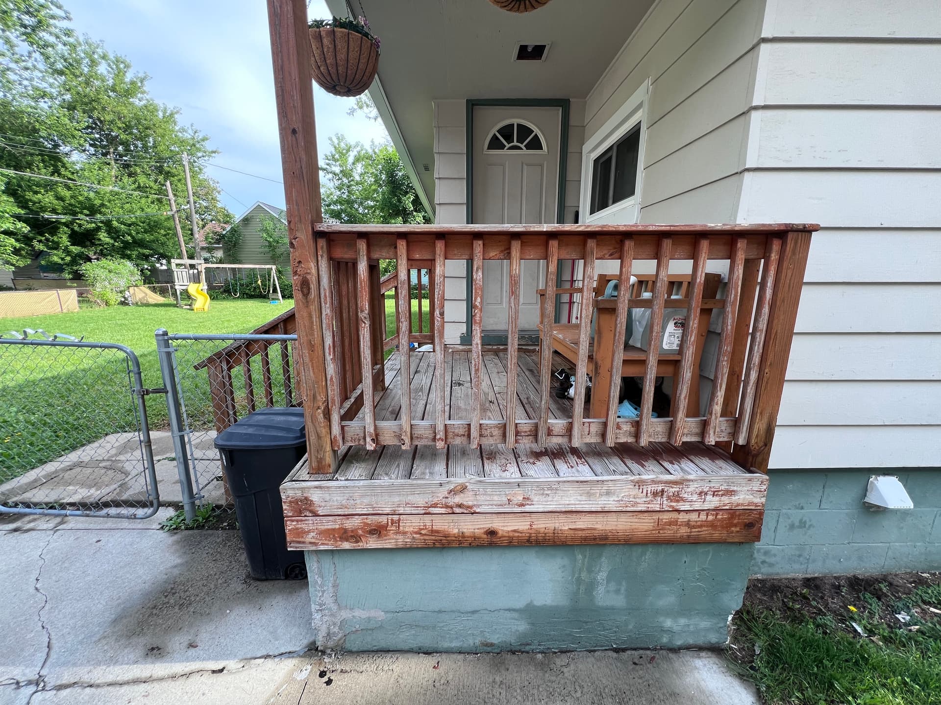 Worn-Out Front Porch Gets Full Rebuild and Fresh Stain image