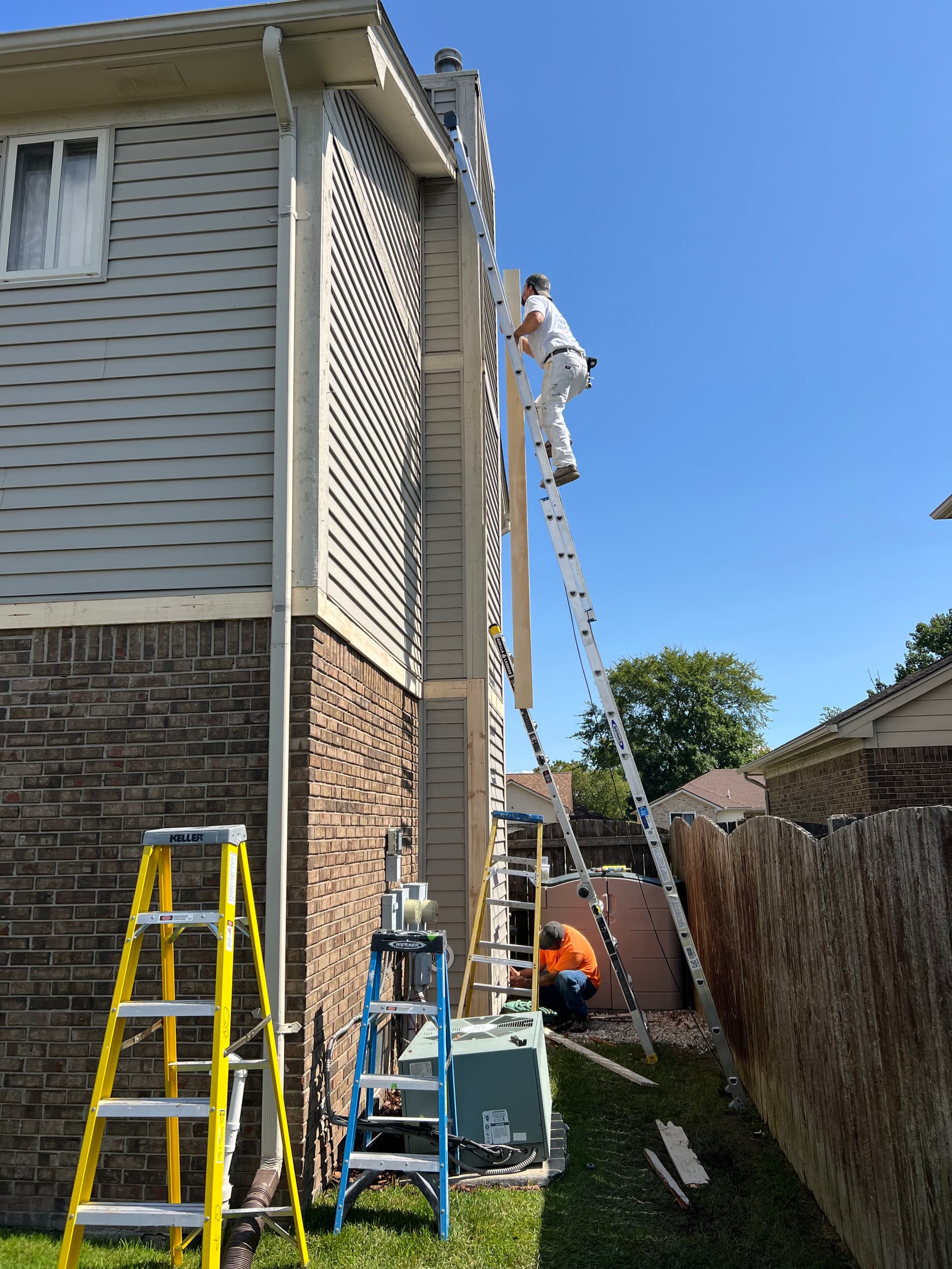 Exterior Trim Replacement and Fresh Paint on a Two-Story Home image