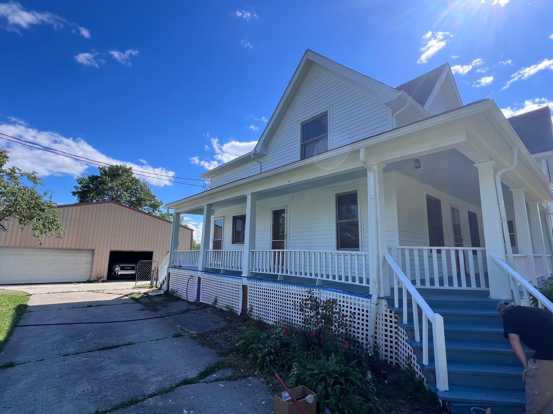 Gallery photos for Peeling Wood Siding and Porch Gets a Full Exterior Paint Overhaul: Image #3