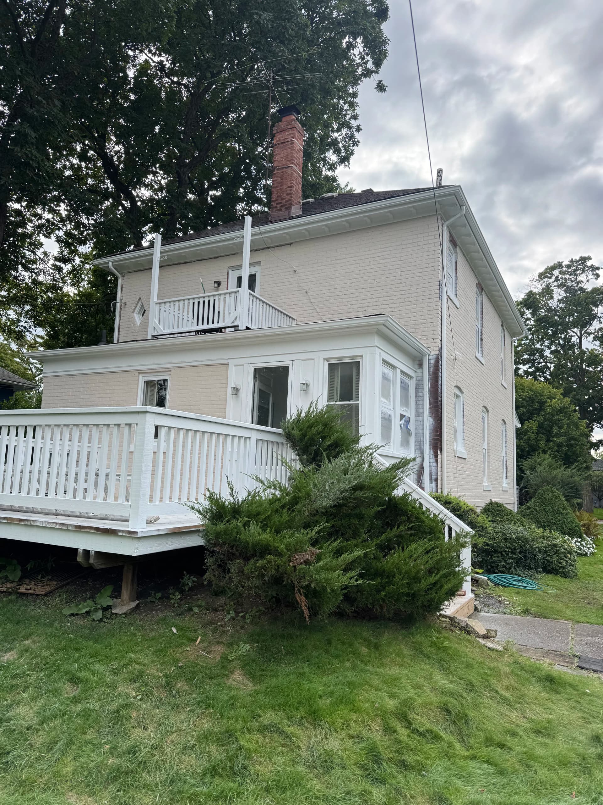 Gallery photos for Painted Brick Exterior Before and After on a Classic Two-Story Home: Image #7