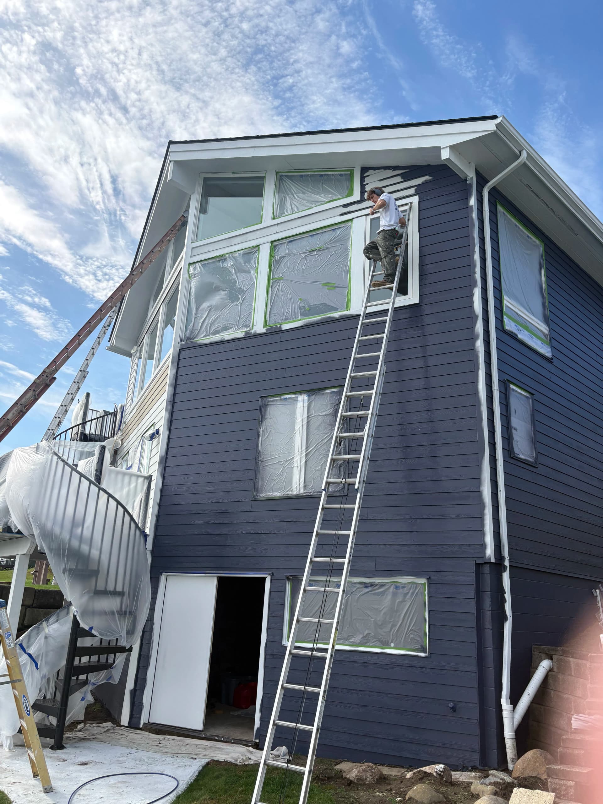 Bold Navy Exterior Paint on a Lakefront Home image