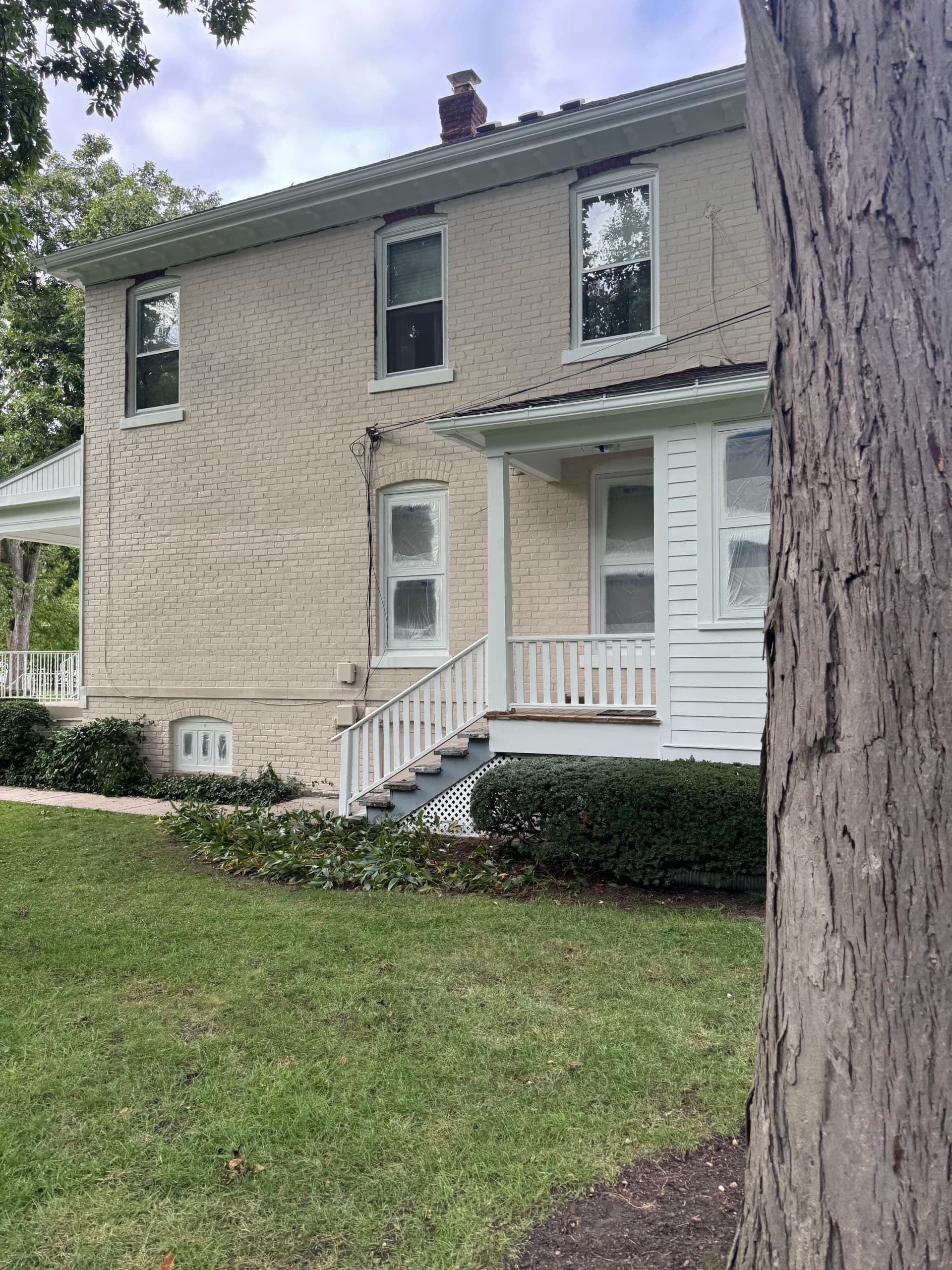 Gallery photos for Painted Brick Exterior Before and After on a Classic Two-Story Home: Image #5