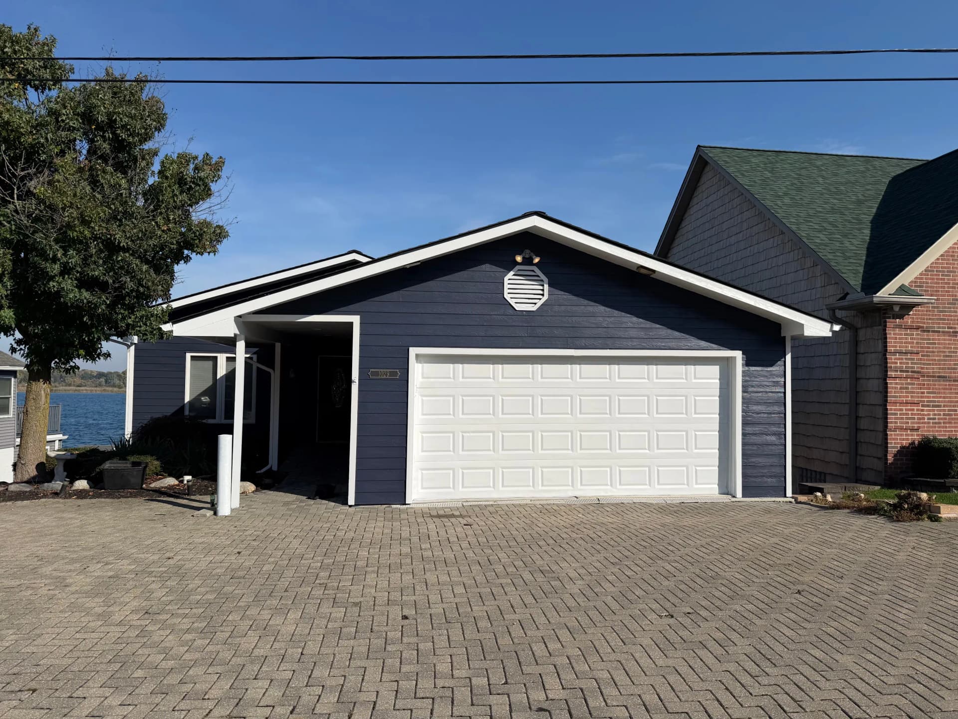 Gallery photos for Bold Navy Exterior Paint on a Lakefront Home: Image #4