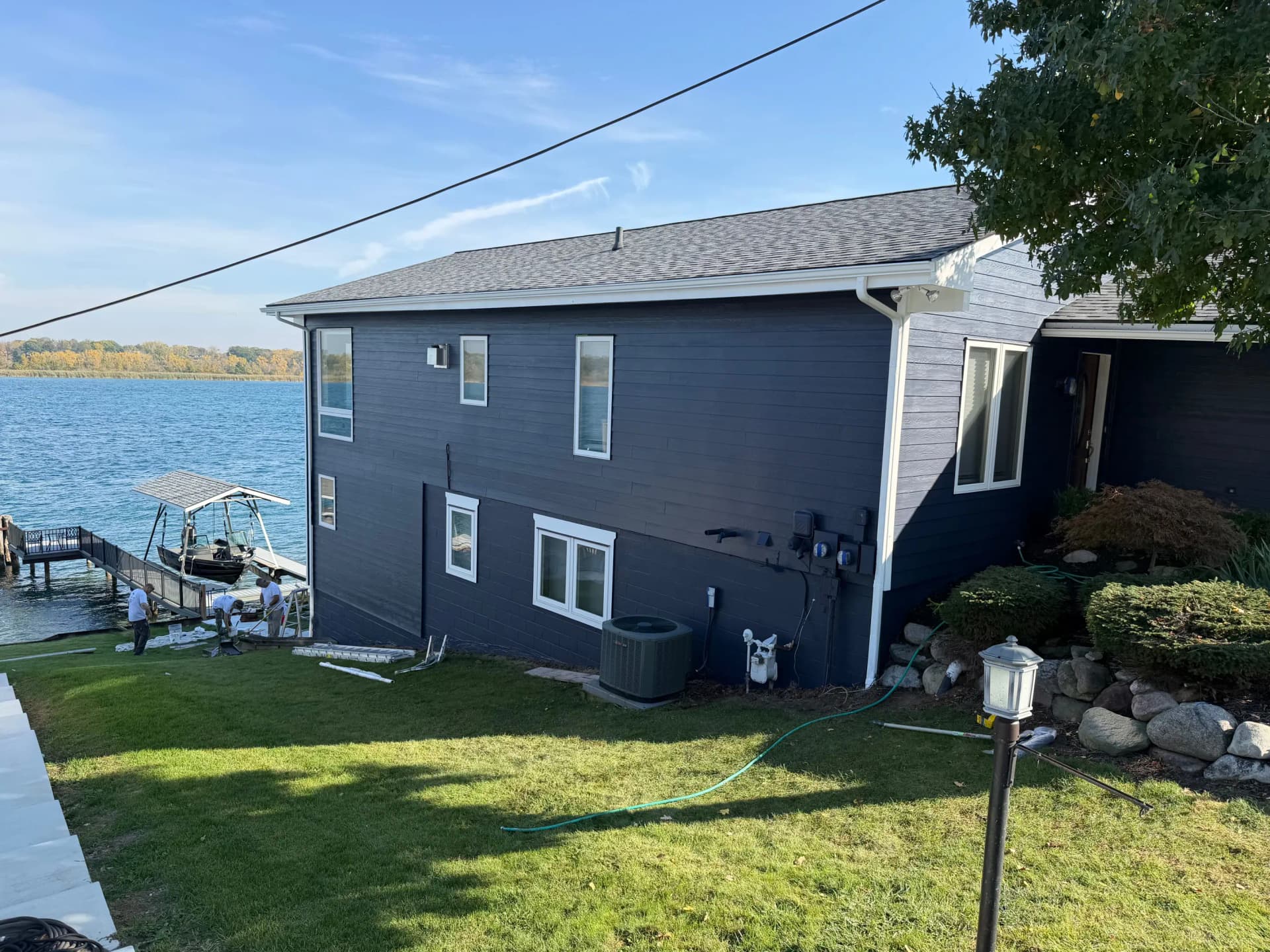 Gallery photos for Bold Navy Exterior Paint on a Lakefront Home: Image #7