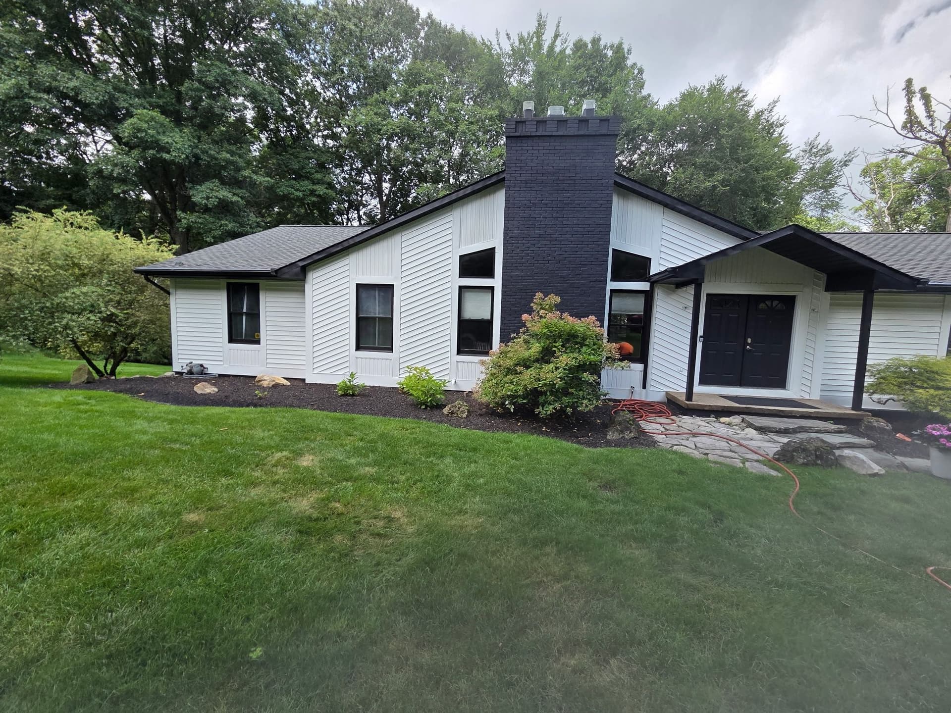 Gallery photos for White Siding, Black Brick, Fresh Deck - Full Home Exterior Repaint: Image #9