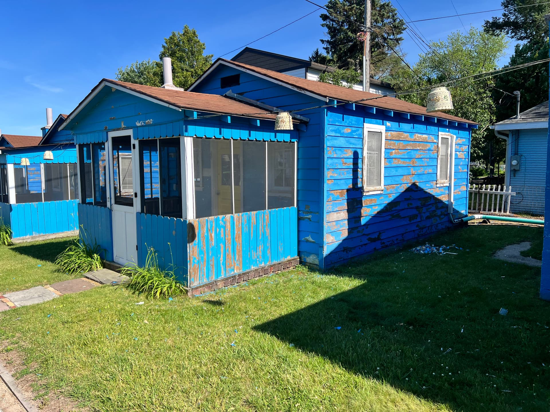 Gallery photos for Prepping Weathered Lakefront Cabins for a Fresh Coat of Paint: Image #1
