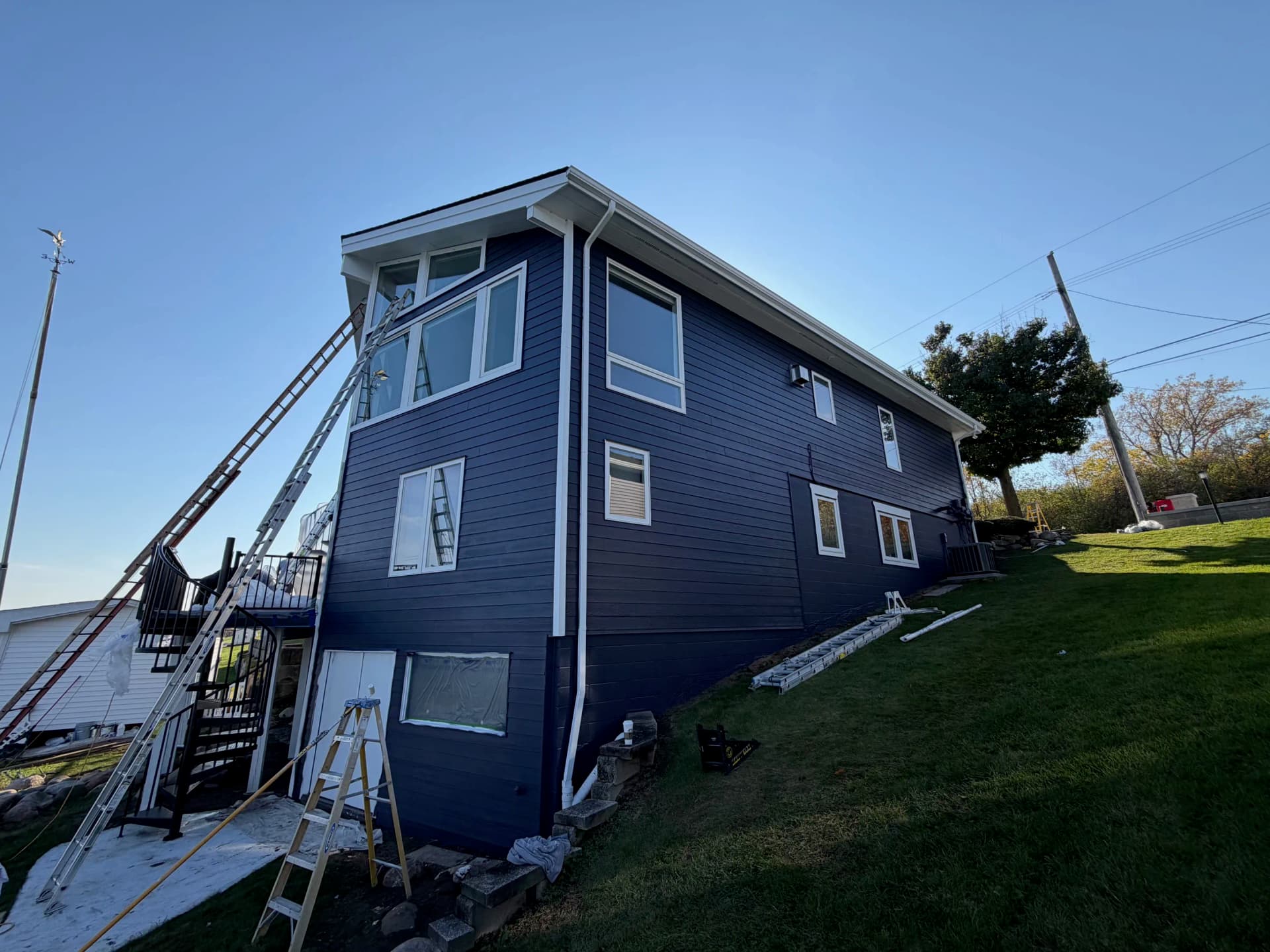 Gallery photos for Bold Navy Exterior Paint on a Lakefront Home: Image #1
